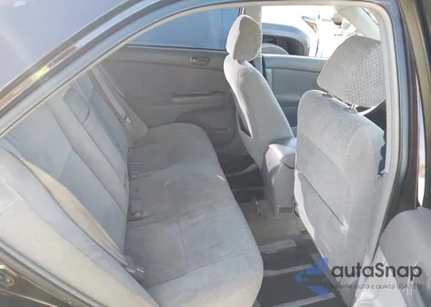 2003 Toyota Camry Le z USA, uszkodzony, nr VIN 4T1BE32KX3U662140